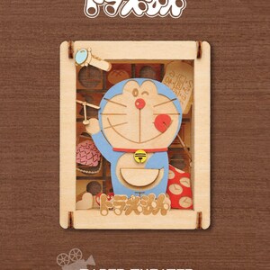 May include: A wooden craft kit featuring a 3D model of Doraemon, a popular Japanese cartoon character. The kit is part of the Paper Theater series and is labeled "wood style".