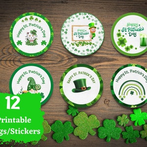 May include: Twelve printable St. Patrick's Day tags or stickers with various designs. The designs include a leprechaun, a cat, a rainbow, a shamrock, and a beer mug. The tags are all round and have a white background with green accents.