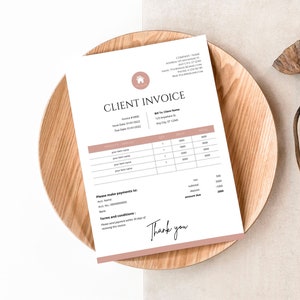 May include: A minimalist client invoice template with a house icon in the top left corner. The invoice includes the invoice number, invoice date, due date, bill to information, product details, and payment information. The invoice has a thank you message at the bottom.