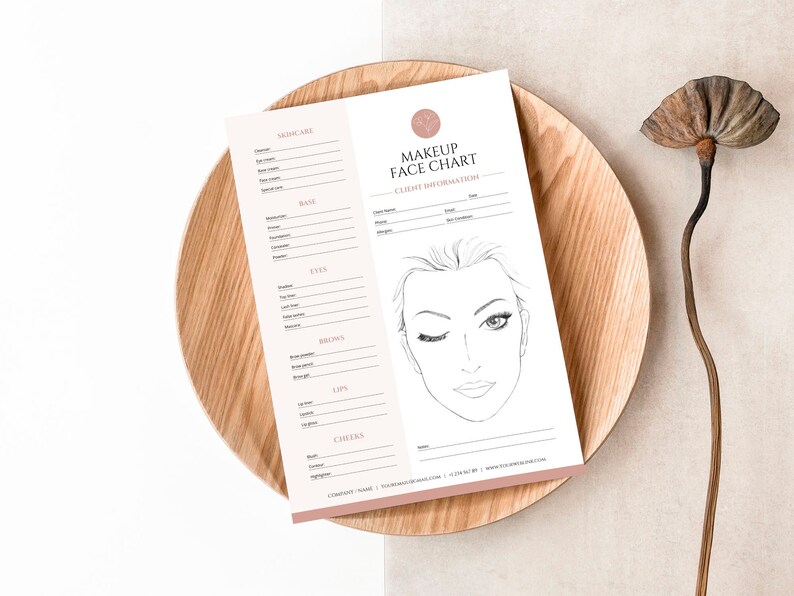 May include: A printable makeup face chart with a line drawing of a woman's face. The chart includes sections for skincare, base, eyes, brows, lips, and cheeks. The chart also includes a client information section with fields for name, email, and phone number.