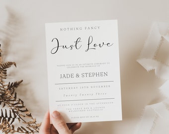 May include: A white wedding invitation card with black text. The card reads "Nothing Fancy Just Love" and includes the names "Jade & Stephen" and the date "Saturday 19th November Twenty Twenty Three".