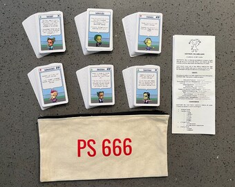 May include: A card game set featuring multiple stacks of white cards with cartoon illustrations and text, alongside a printed instruction sheet and a beige canvas bag with "PS 666" in red. The cards have blue borders.