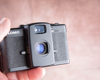 Film camera LOMO LC-A black Lens Minitar-1 32mm f/2.8. Made in USSR.