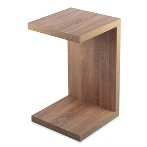 May include: A wooden C-shaped side table with a light brown finish.