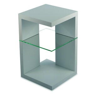 May include: A gray side table with a glass shelf. The table has a square top and a rectangular base.
