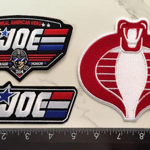 G.I. JOE Cobra-befälhavare 3-pack sy-på-märke med USA-flagga