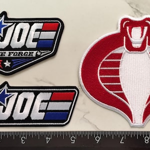 G.I. JOE Cobra-befälhavare 3-pack sy-på-märke med USA-flagga