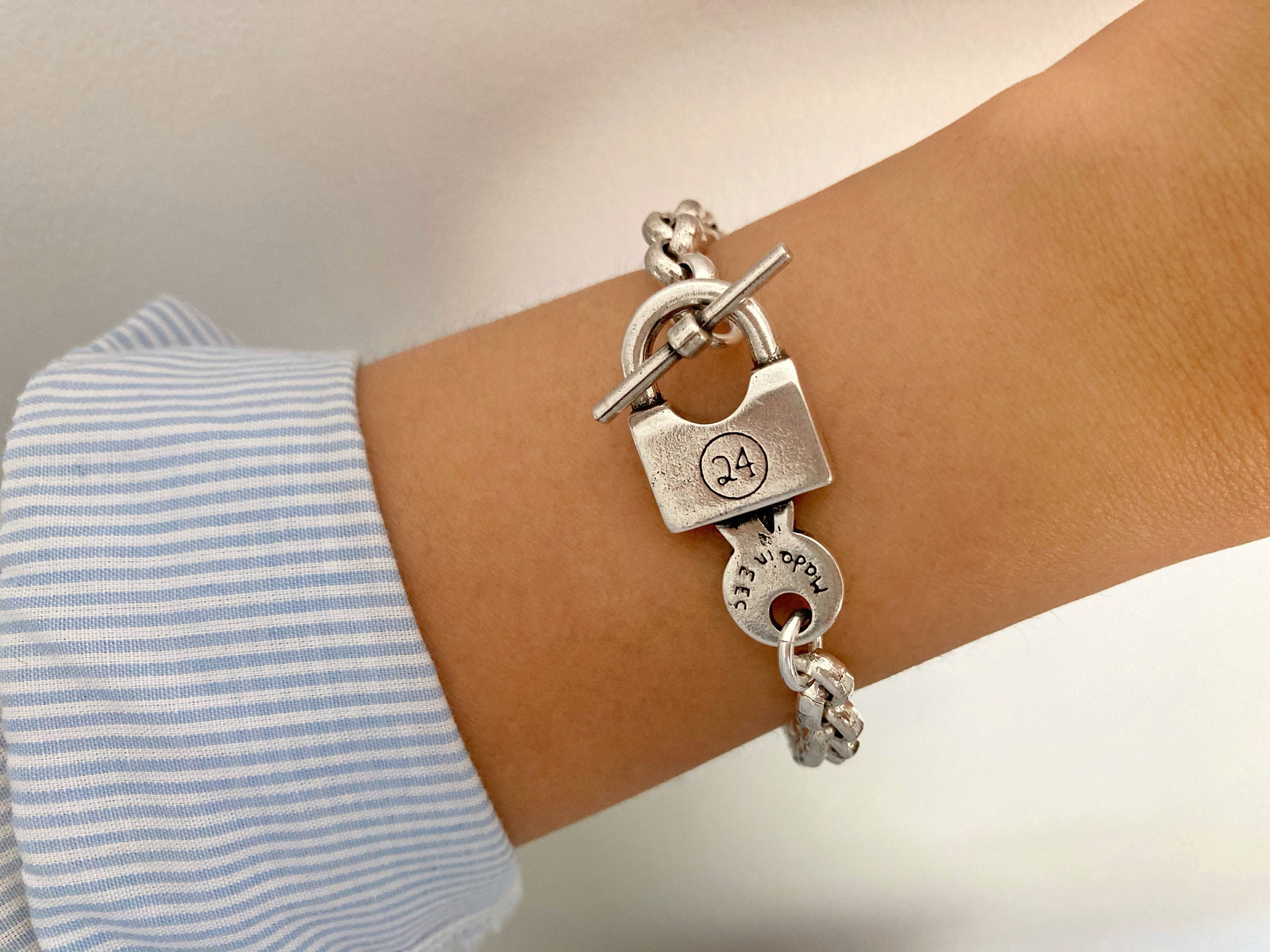 Cadenas HERMES Cadena Hippopotame 2005 Argent - Breloque Sac - Occasion Bon état