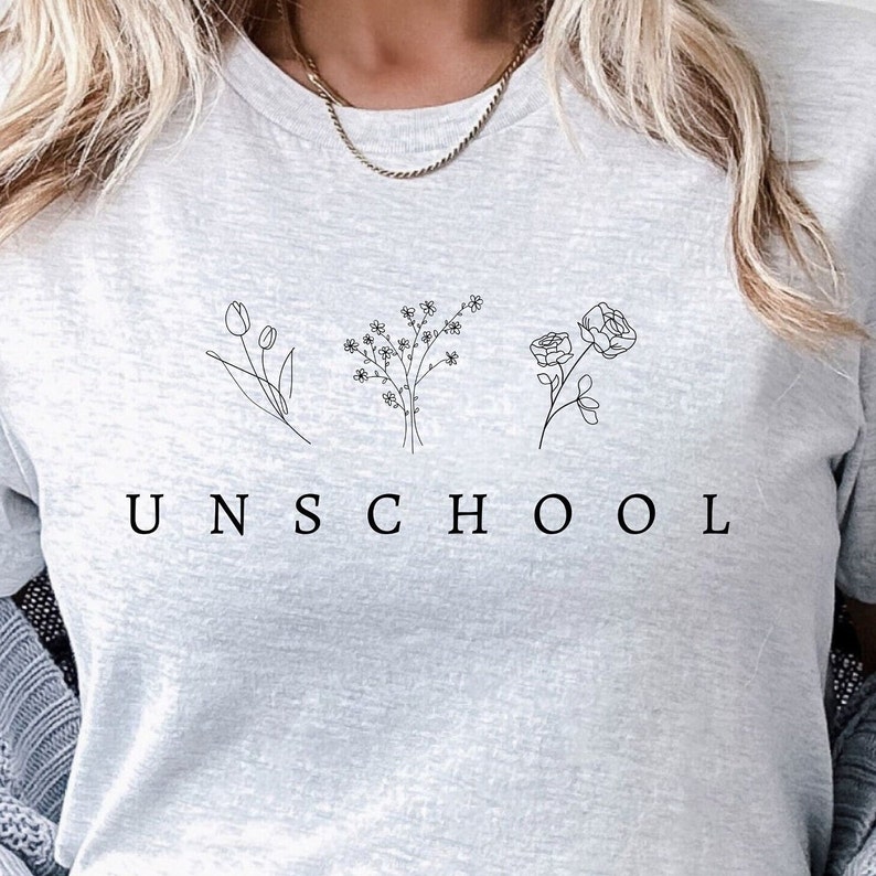 Unschool Homeschool Mom Shirt Raise Them Wild And Free Shirt Back to School Mama Wildflower Gift for Her Graphic Tee Mama Not All Classrooms Have Four Walls Outdoor Crunchy Homeschooling Present Her T-shirt Conspiracy Realist Theorist Theories Homeschooler Gifts Her Wife Mother Motherhood Free Thinker Truth Homemaker Stay At Home Mom Tin Foil Hat Humor Crunchy Conservative Libertarian Freedom Free Anti Government System For Friends Trendy Minimalist Aesthetic MAHA RFK Jr Agenda Co-op Unschooling