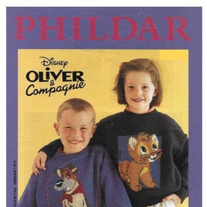 May include: A knitting pattern booklet featuring Disney's Oliver & Company. The cover shows two children wearing sweaters with Oliver and a kitten from the movie.