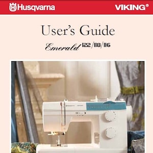 May include: A white sewing machine with a blue top and a needle threaded with white thread. The machine is sitting on a table with spools of thread and a measuring tape.