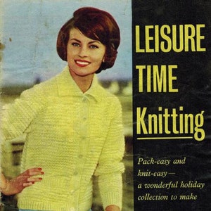May include: A woman wearing a yellow knitted cardigan with a blue shirt underneath. The text "Leisure Time Knitting" is printed in yellow on a black background. The text "Pack-easy and knit-easy - a wonderful holiday collection to make" is printed in white on a black background. The text "Presented by WOMAN'S WEEKLY" is printed in white on a red background.
