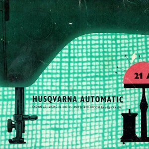 May include: A green and black sewing machine with a white and red pincushion labelled "21 A" on a green and white chequered background. The text "HUSQVARNA AUTOMATIC" is printed below the machine. The text "KNOWN AS: VIKING IN THE US AND NORDIC HUSQVARNA IN CANADA" is printed below the machine.