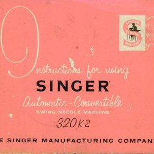 May include: A coral-colored instruction manual for a Singer Automatic-Convertible swing-needle sewing machine, model 320K2. The cover features the Singer logo, the text 9 Instructions for using SINGER Automatic-Convertible, and The Singer Manufacturing Company.