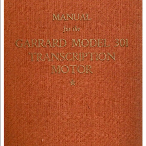 May include: An orange cover for a manual for the Garrard Model 301 Transcription Motor.