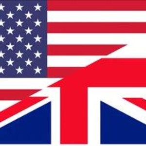 May include: A red, white, and blue American flag and a red, white, and blue Union Jack flag are superimposed on each other. The American flag is on the left and the Union Jack is on the right. The flags are both flying in the wind.