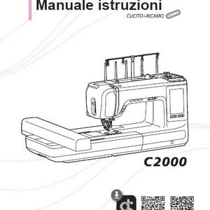 May include: Black and white line drawing of a sewing machine with the text "Manuale istruzioni" and "CUCITO+RICAMO COMBO C2000".
