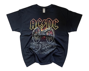 Maglietta vintage AC/DC con grafica del cannone, taglia XL, nera, stile rock.