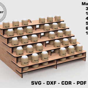 May include: A wooden display stand with five shelves for displaying small jars or bottles. The stand is made of wood with a light brown finish and has black edges. The stand is labelled "By Laser" and has the text "SVG - DXF - CDR - PDF - AI" at the bottom. The stand is designed to hold 30 jars or bottles.