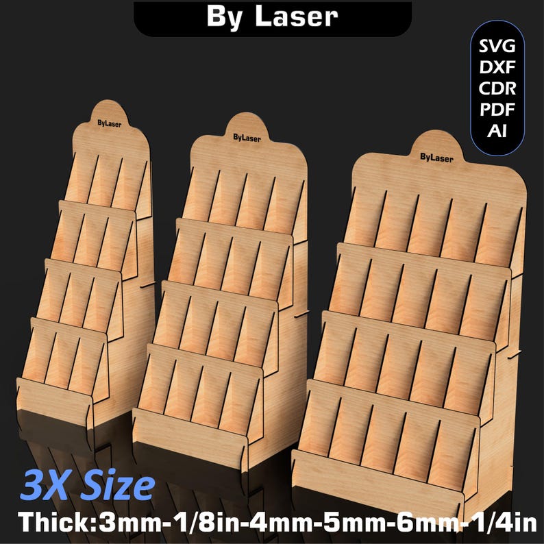 Puede incluir: Tres expositores de madera con m&uacute;ltiples estantes. Los expositores est&aacute;n etiquetados como "By Laser" y "3X Size". El grosor se indica como 3mm-1/8in-4mm-5mm-6mm-1/4in. La imagen tambi&eacute;n incluye iconos de tipo de archivo: SVG, DXF, CDR, PDF y AI.