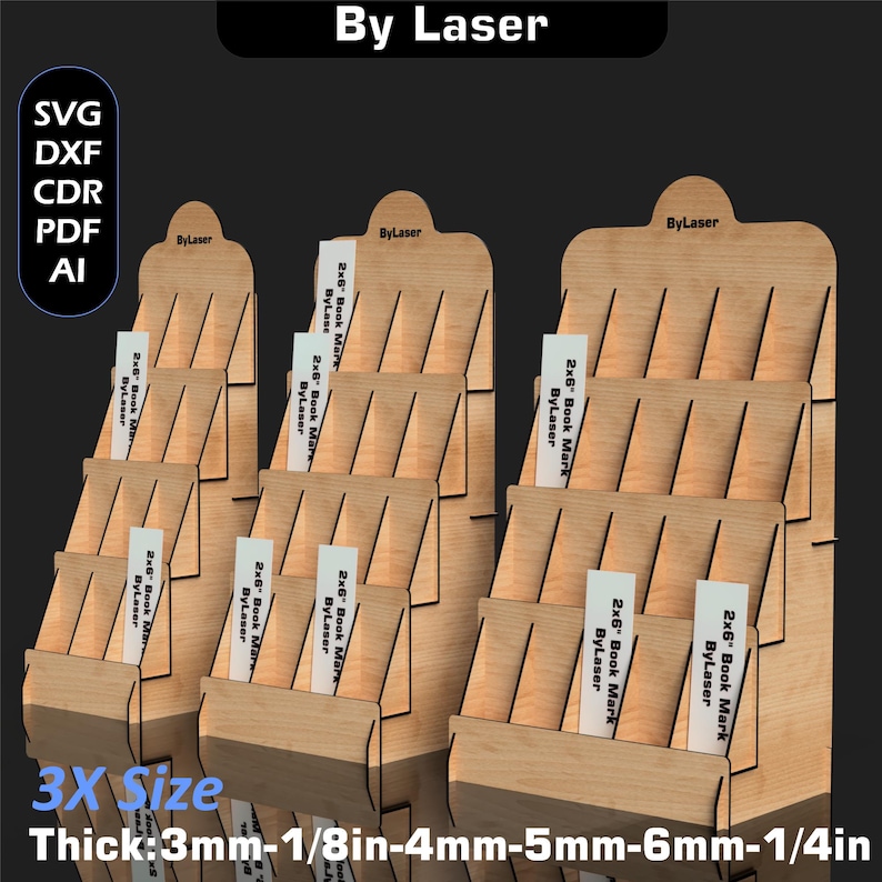 Puede incluir: Expositores de madera con m&uacute;ltiples estantes, cada uno con varios marcadores de libros de 2x6". Los expositores est&aacute;n etiquetados como "By Laser" y est&aacute;n disponibles en varios grosores, incluyendo 3mm, 4mm, 5mm y 6mm. El texto "3X Size" tambi&eacute;n es visible.