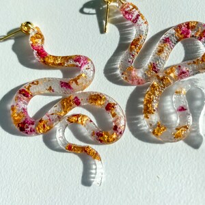Statement snake earrings infused with real rose petals and gold flakes