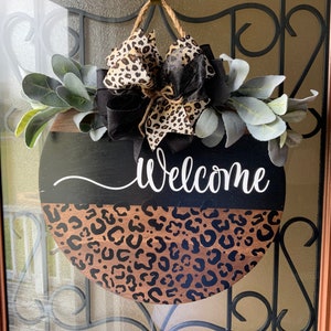 Ronde deurhanger Leopard Welcome