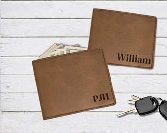 May include: Two brown leather wallets with personalised names. One wallet has the name "William" and the other has the initials "PJH".