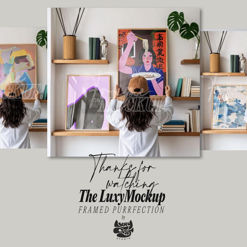 May include: A person arranging framed art prints on a shelf. The prints include a colorful abstract piece, a purple gorilla, and a woman eating noodles. The scene is set against a white wall with wooden shelves and decorative items.