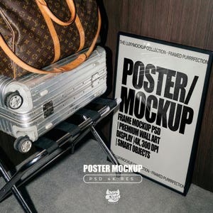 May include: A framed poster mockup with the text "POSTER/MOCKUP" in black. A silver suitcase with wheels and a brown leather bag sit on a black luggage rack. The luggage rack has a silver frame.