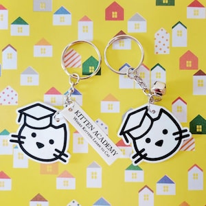 Shrink Plastic Kitten Academy Logo Keychains