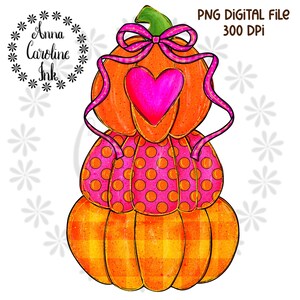May include: A digital illustration of a stacked pumpkin design. The top pumpkin has a pink heart and bow, the middle pumpkin has pink polka dots, and the bottom pumpkin has an orange plaid pattern. The text "PNG DIGITAL FILE 300 DPI" is at the top.