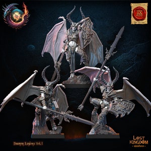 May include: Three gray plastic miniature figures of female demons with horns, wings, and weapons. The figures are posed in dynamic stances and are compatible with the "IX Age" game system. The figures are part of the "Daemon Legions Vol. 1" set.