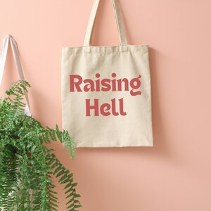 Raising Hell Tote: Woman Empowerment Polyester Bag