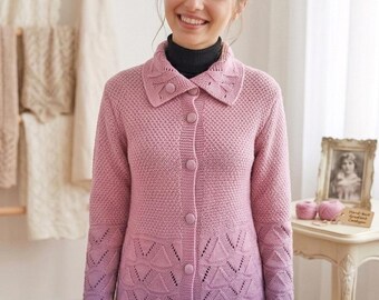 May include: A long-sleeved knit cardigan featuring a pink to purple ombre gradient. The garment has a collared neckline, five matching buttons down the front, and a textured stitch pattern on the upper body with a triangular lace design below.