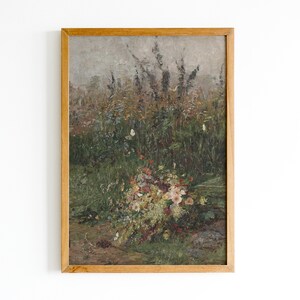 Pode incluir: Uma pintura emoldurada que retrata um buqu&ecirc; de flores silvestres em um campo. As flores s&atilde;o uma mistura de rosa, branco e amarelo, e o campo &eacute; de um verde e marrom opacos. A pintura est&aacute; sobre um fundo branco.