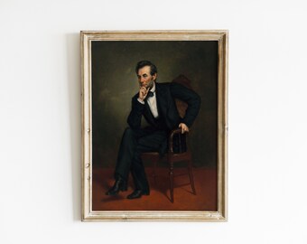 May include: A framed oil painting of Abraham Lincoln sitting in a chair, wearing a black suit and a white bow tie. He is looking to the left and has his hand on his chin.