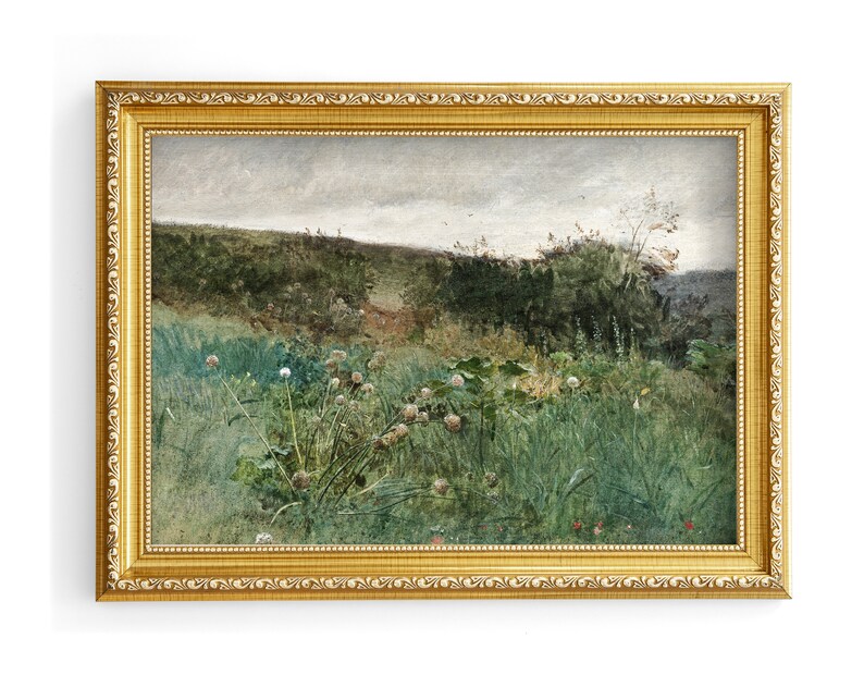 May include: A framed landscape painting with a gold ornate frame. The artwork depicts a field of tall green grass and wildflowers under a cloudy sky. The painting has a vintage aesthetic.