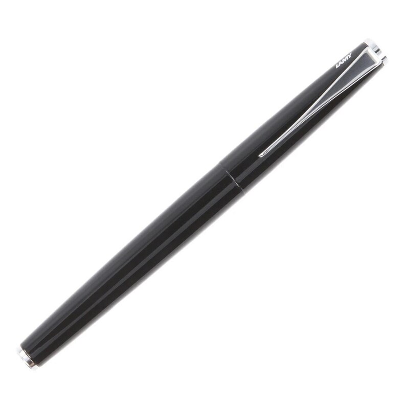 May include: A black fountain pen with a silver clip and the word "LAMY" engraved on the clip.
