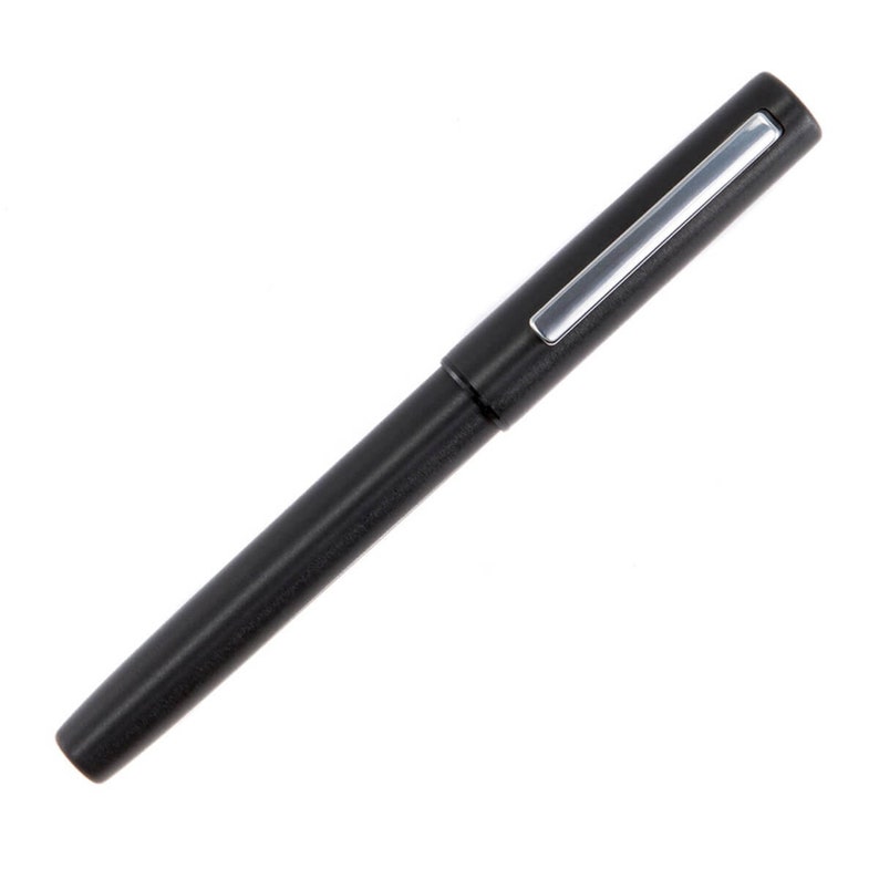 May include: A black fountain pen with a silver trim on the cap.