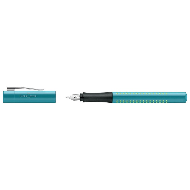 May include: A turquoise blue fountain pen with a black grip and green dots. The pen is in two parts, the cap and the pen body. The cap has the words "FABER-CASTELL" printed on it.