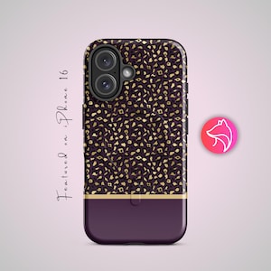 May include: A phone case with a dark purple and gold leopard print design. The case has a gold stripe and a solid dark purple bottom. The text "Featured on iPhone 16" is written on the left side of the case.