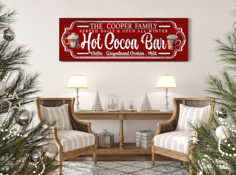 May include: A red wooden sign with white text that reads "The Cooper Family Served Daily & Open All Winter Hot Cocoa Bar Coffee Gingerbread Cookies Milk". The sign has a rustic look and features images of mugs of hot cocoa.