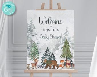 May include: Welcome to Jennifer's Baby Shower sign with a watercolor winter forest scene. The sign features a bear, fox, deer, owl, and raccoon in the forest.