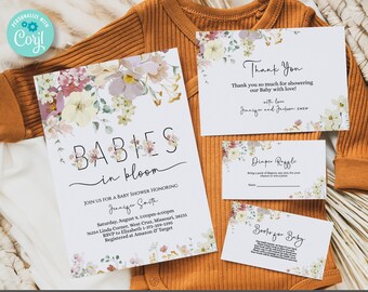 May include: A floral baby shower invitation with the text "Babies in Bloom" and a floral design. The invitation includes the date, time, location, and RSVP information. It also includes a diaper raffle and books for baby cards.