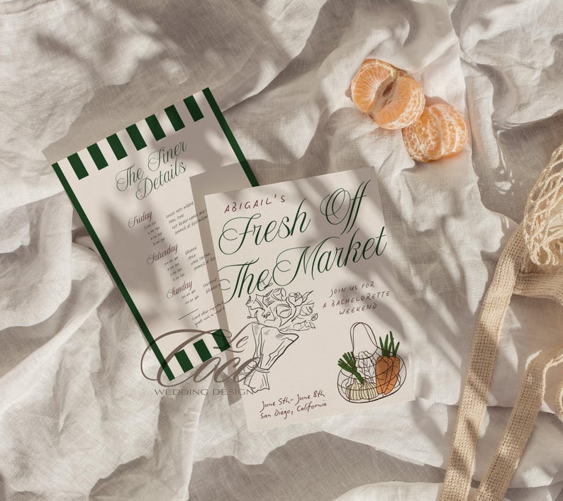 May include: A white card with green text and illustrations. The text reads "Abigail's Fresh Off The Market" and "Joins us for a Bachelorette Weekend". The card also includes the dates "June 5th - June 8th" and the location "San Diego, California".