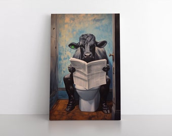 May include: A rectangular canvas print featuring a black cow sitting on a white toilet in a bathroom. The cow has a bright green ear tag and is holding an open newspaper. The background shows blue walls and a wooden floor, with a door frame visible.