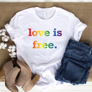 Love is Free shirt | Gay Pride Shirt | T Shirt for LGBTQ+ Community | Lesbian, Bi, Gay, Trans, Queer | Love is Free Shirt Rainbow Lettering