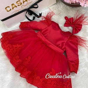 Veronica dress red. Knee-length toddler girl dress with red feather detail. Red Christmas baby girl dress. Red lace big bow baby girl dress