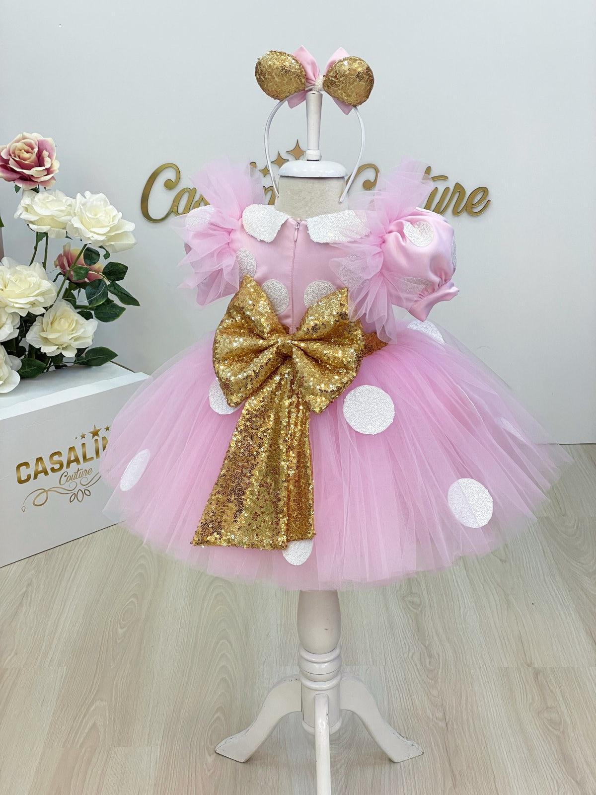 ミニーのドレス。ピンクのミニーマウスのコスチューム。幼児用ミニーの